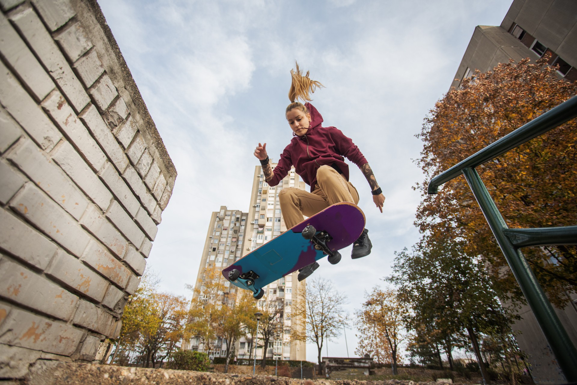 Skater woman jumping on her skate.